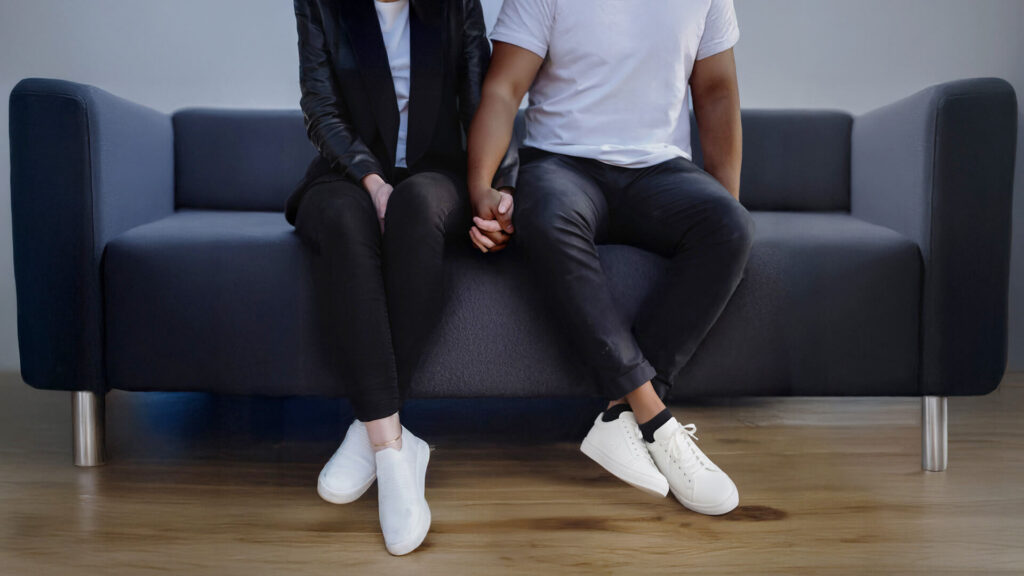 Couples Counselling Vancouver with couple sitting on couch in session